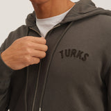 OKAICOS Grey Chenille Embroidered Zip Up Hoodie Sweatshirt Embroidered Turks And Caicos On Model Close Up