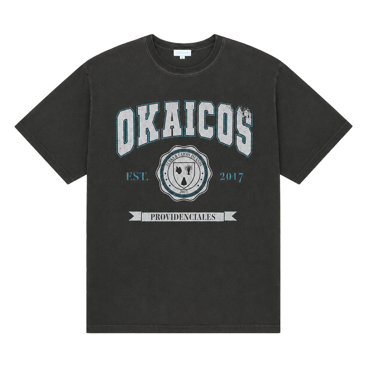 A short sleeve cotton Okaicos Black University TShirt Turks and Caicos on white back drop