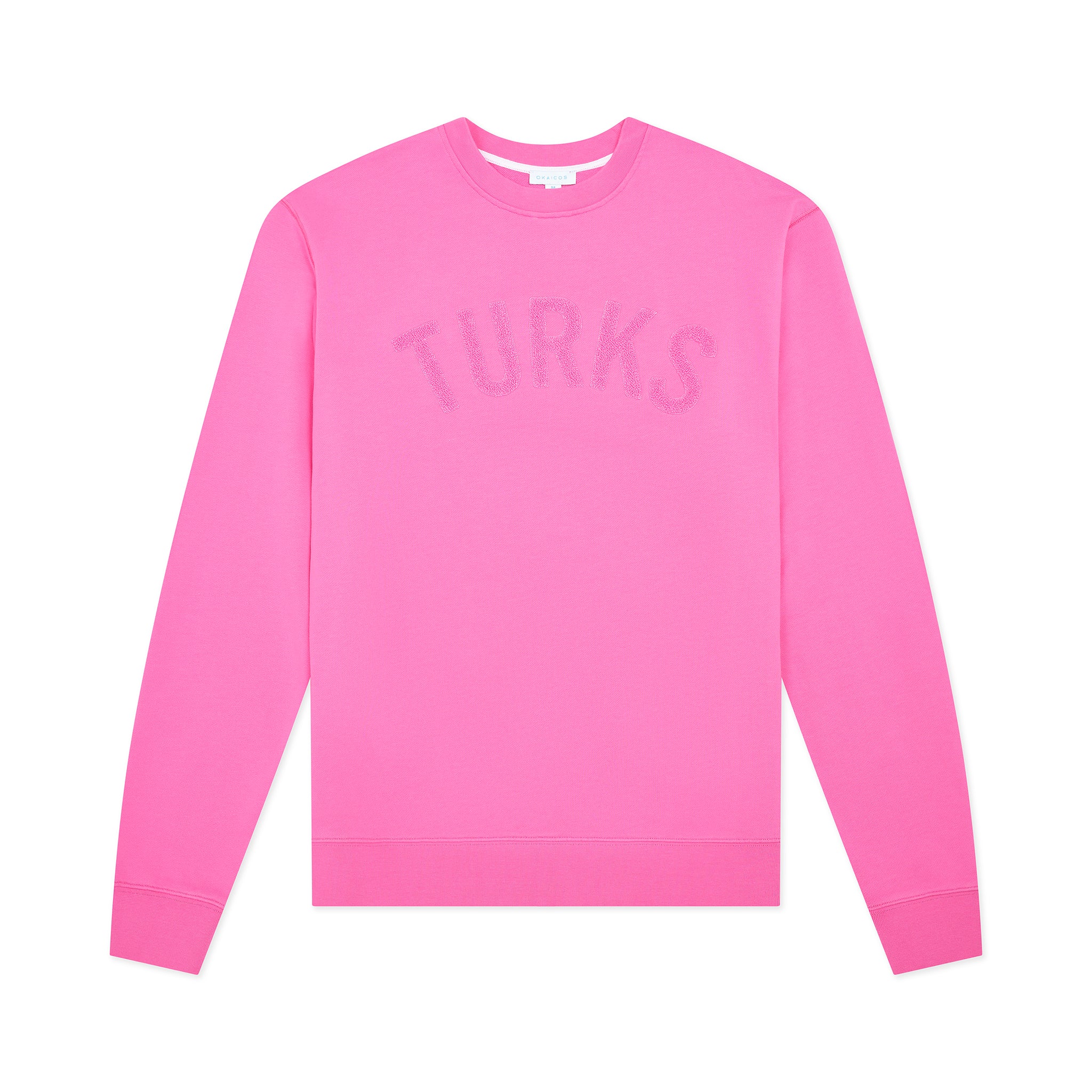 Pink sweatshirt with 'TURKS' text on a white background