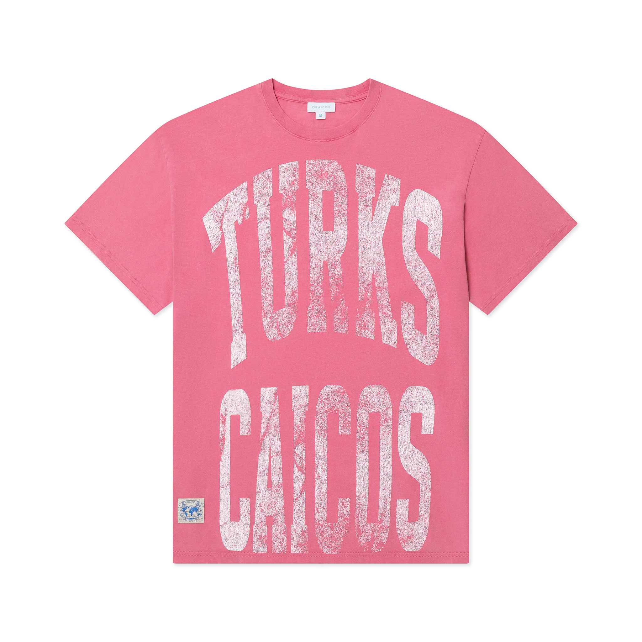Pink t-shirt with 'Turks & Caicos' text on a white background