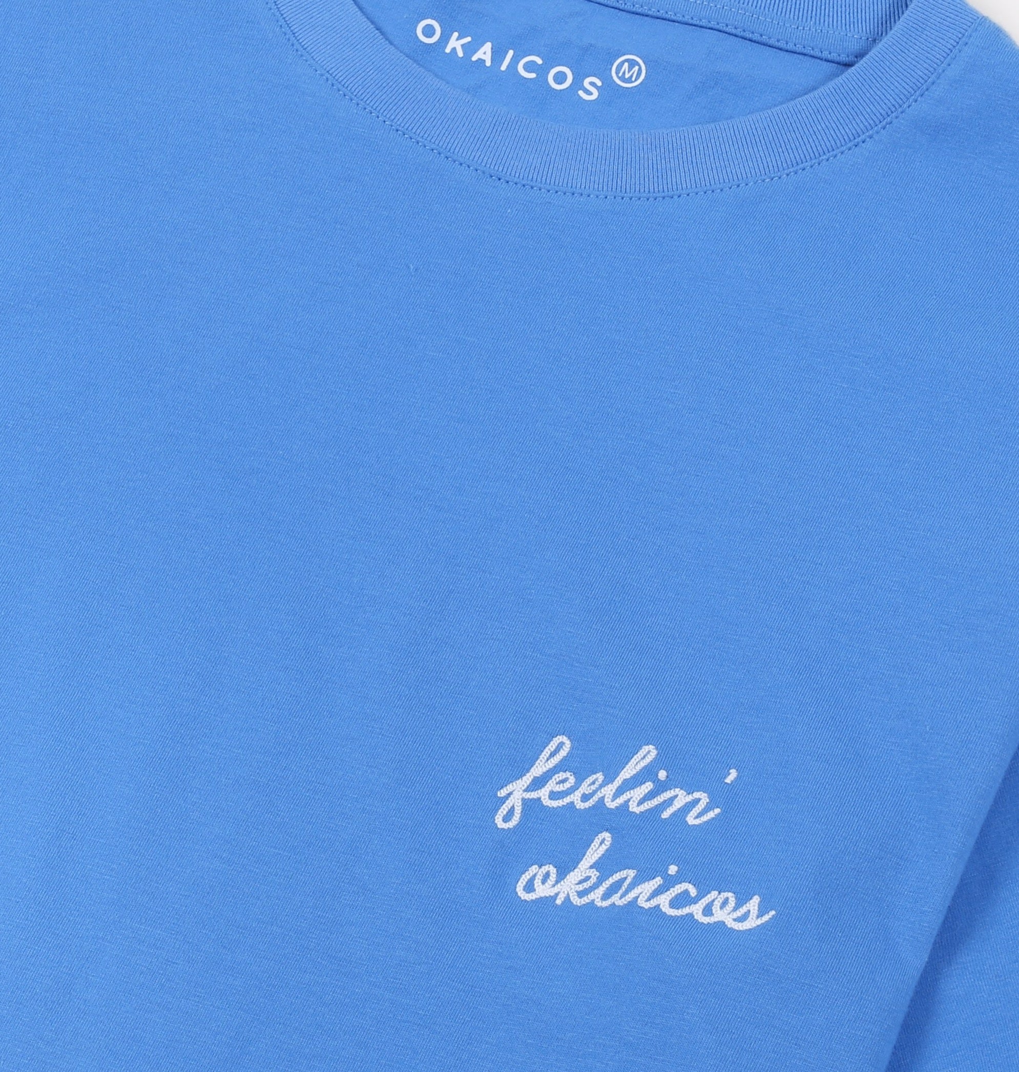OKAICOS Blue Lightweight Breathable TShirt Feelin OKAICOS Cursive Chain Stitch Close Up
