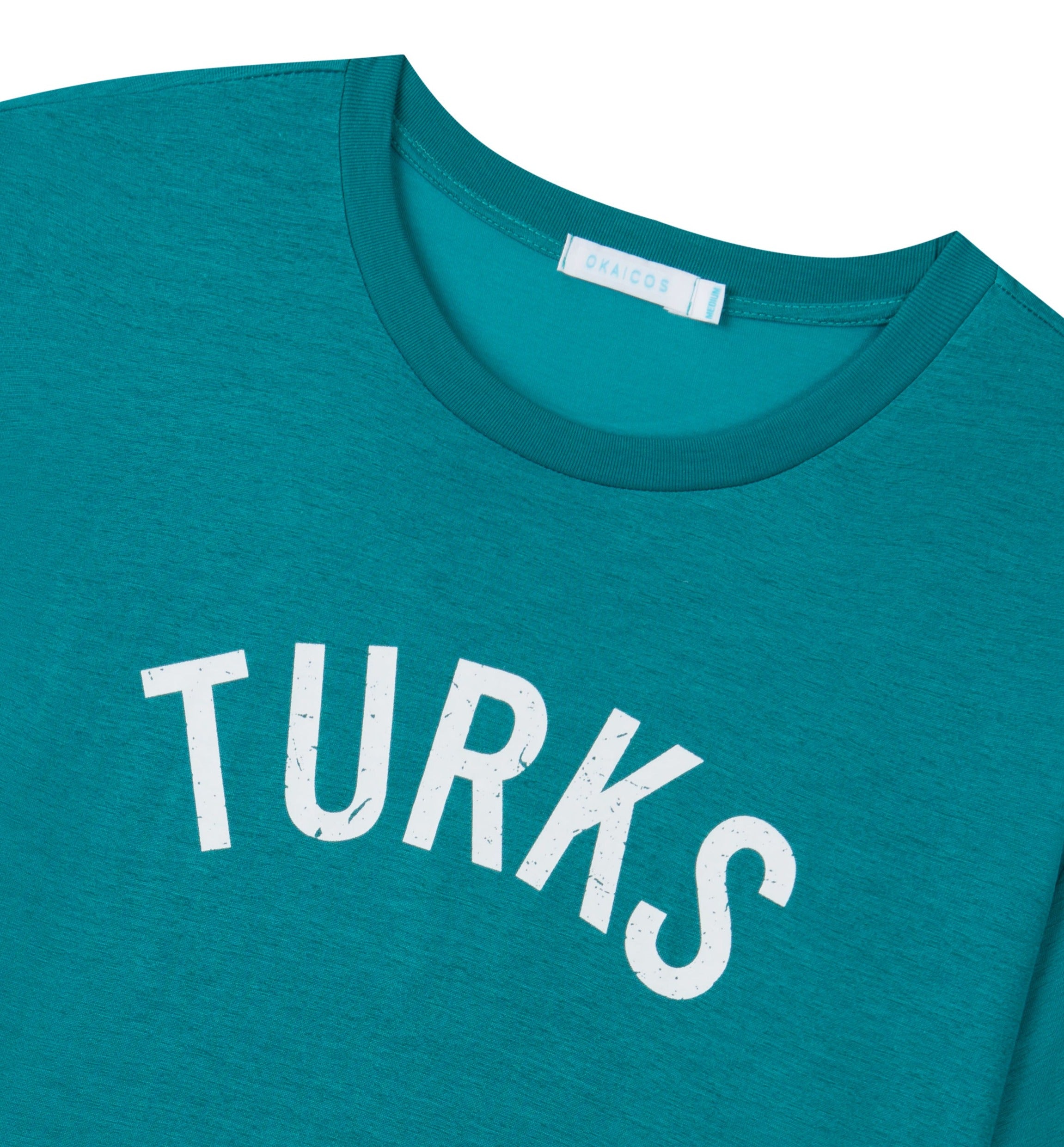 OKAICOS Green Lightweight Breathable TShirt White Turks and Caicos Vintage Print Close Up