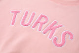 Pink Chenille Embroidered Crew Neck Cotton Sweatshirt Embroidered Turks And Caicos Crop Top Close Up