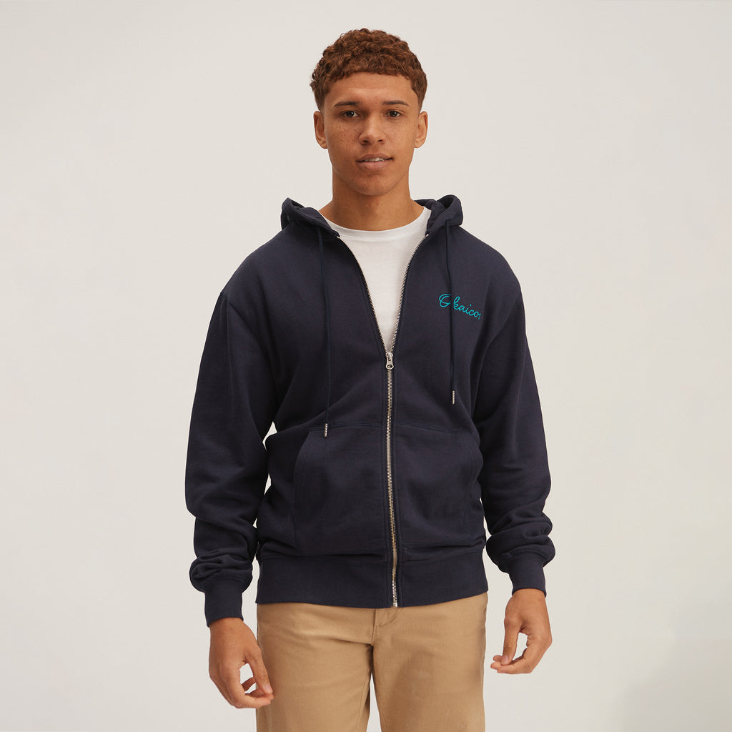 OKAICOS-Navy Embroidered Zip Up Hoodie Sweatshirt Embroidered Turks And Caicos On Model