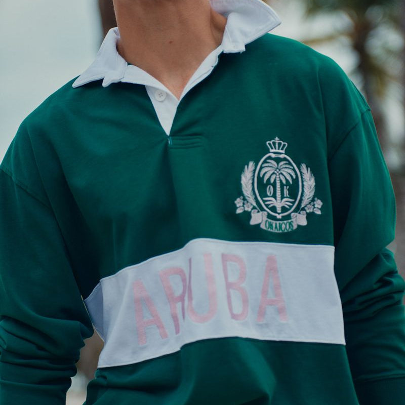 Person wearing a green and white sports jersey with 'Yapuba' branding.