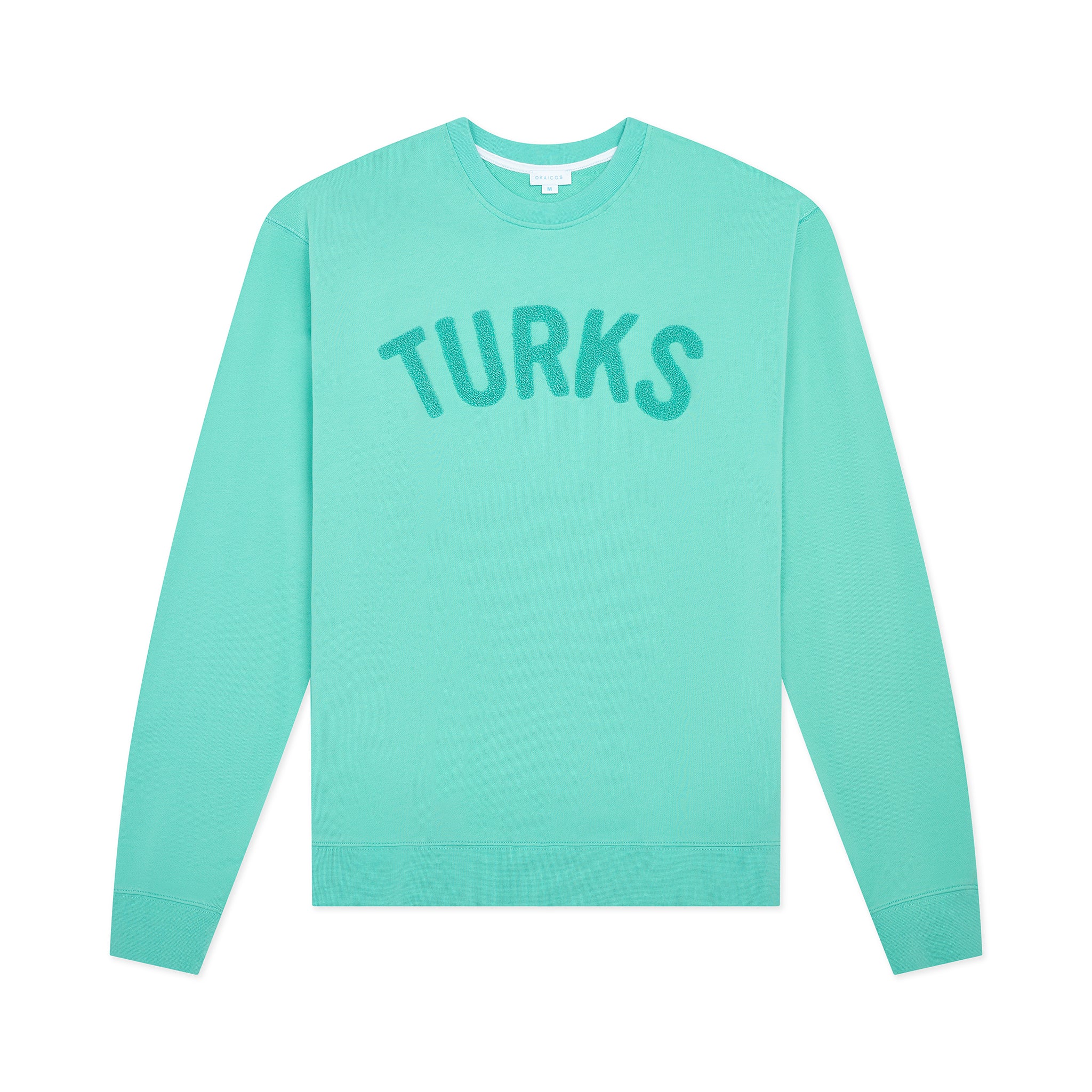 Turquoise sweatshirt with 'TURKS' text on a white background