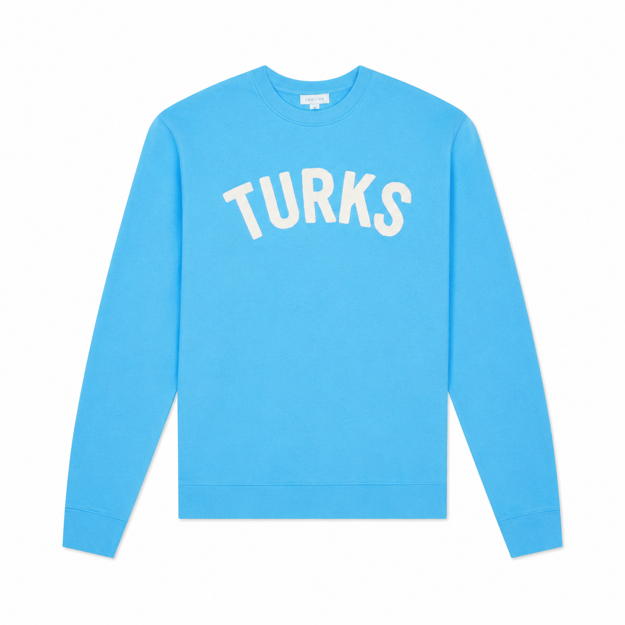 A bright blue crewneck sweatshirt with the word 'TURKS' printed in white arched block letters across the chest, displayed flat against a white background.
