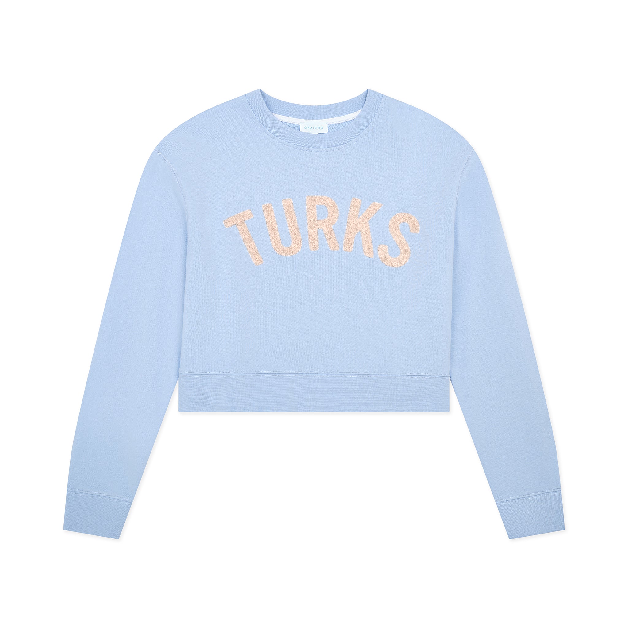 Light blue sweatshirt with 'TURKS' text on a white background