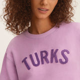 OKAICOS Purple Chenille Embroidered Crop Top Cotton Sweatshirt Embroidered Turks And Caicos Close Up