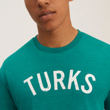 OKAICOS Green Lightweight Breathable TShirt White Turks and Caicos Vintage Print Close Up